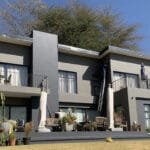 house wall after crack repair and waterproof paint application, showing a smooth and renewed surface.