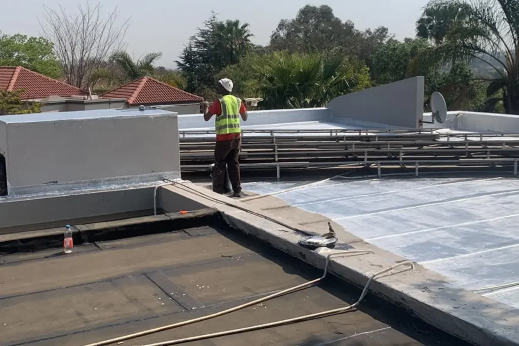 Flat roof waterproofing Bryanston around solar panels with UV protective coating