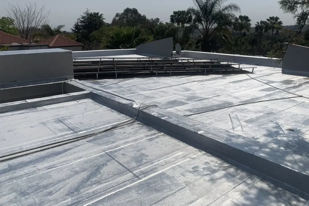 waterproofing-bryanston-completed-project.webp Solar panel roof waterproofing Bryanston completed across flat roof slab and parapet areas