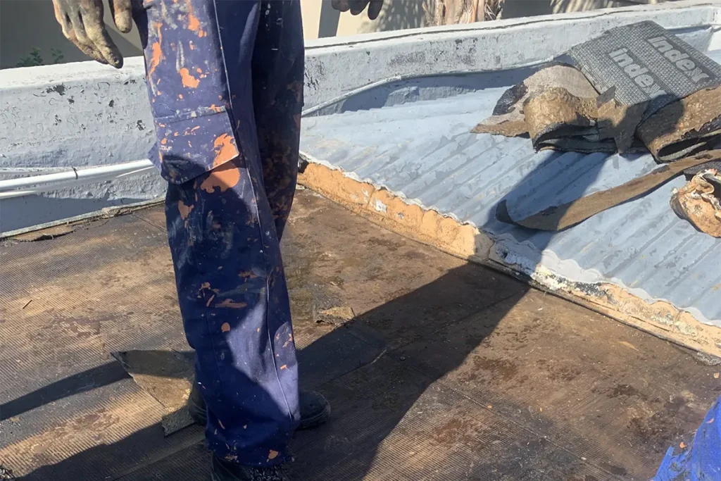 Boarded roof waterproofing Parkhurst with existing torch-on removed before new membrane application