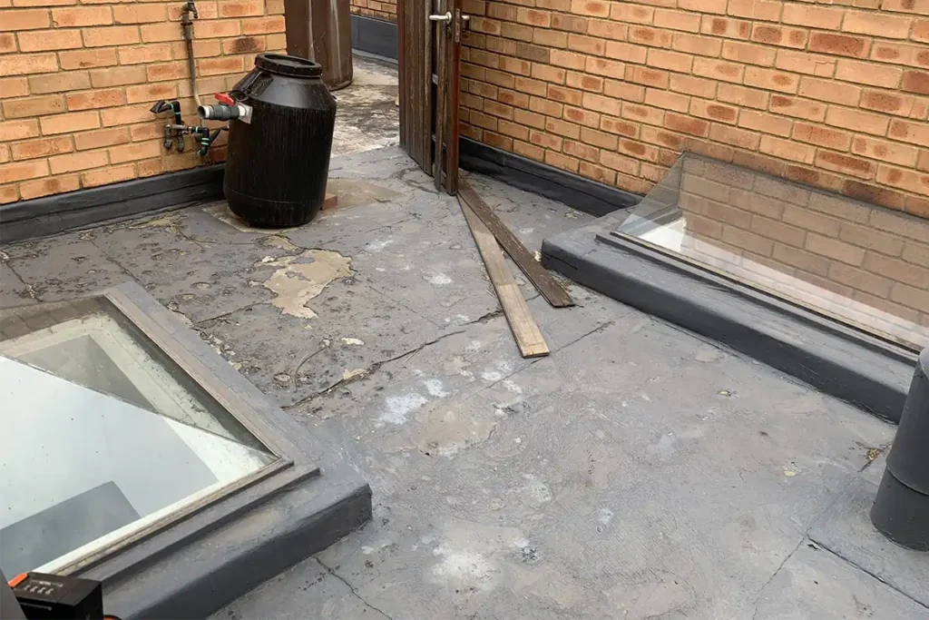Flat roof waterproofing Bedfordview rough roof surface around skylights before waterproofing