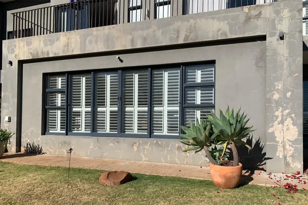 Wall waterproofing Westcliff lounge exterior wall after repair and new paint finish
