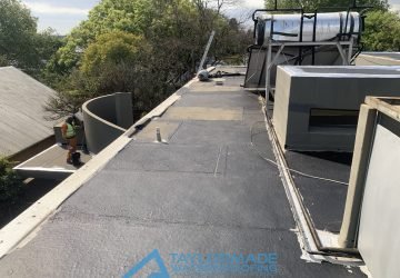 Flat roof at Parktown North showing Torch-On waterproofing already applied by TM Waterproofing before final completion.