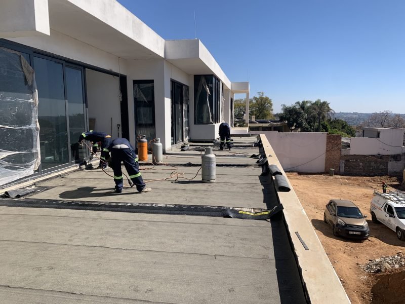 Torch on waterproofing membrane applied on the balcony surface of a luxury Sandton home.