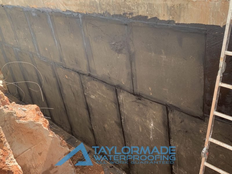 Waterproofing membrane on basement wall of luxury Sandton home, showing wall tanking system in place.